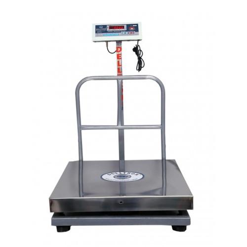 Delltron Platform Weighing Scale 300 Kg 24x24 Inch Platform Scale Capacity: 300 Kg Accuracy In gram: 20g Battery Type: Long in Built Battery Backup Display 12V 500ma SKU: TES.BEN.51223265